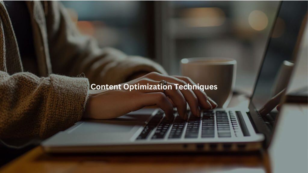The image depicts a person typing intently on a laptop, suggesting they are engaged in content optimization or digital marketing activities. The environment appears to be a cozy, dimly lit space.