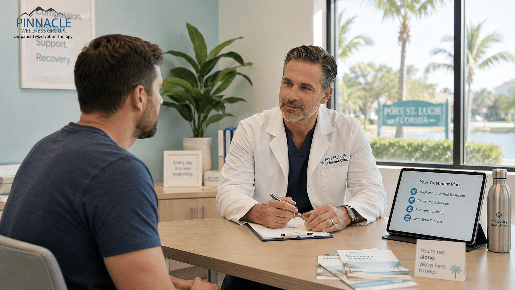 A doctor consulting a patient at a suboxone clinic port St. Lucie about medication-assisted treatment options.